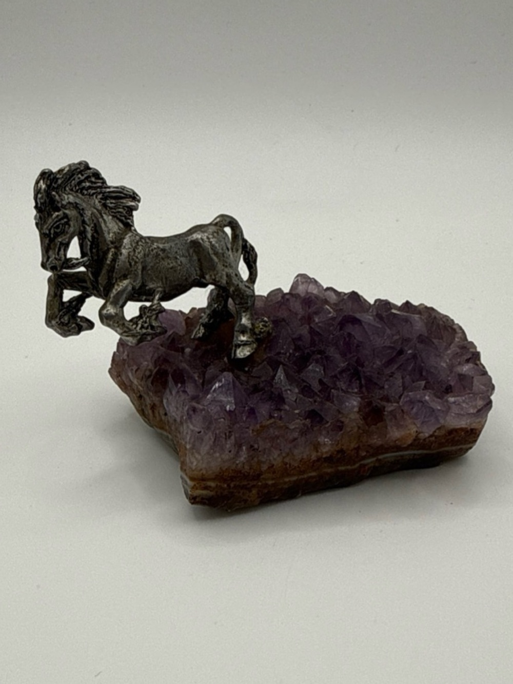 Silver Horse Figurine on Purple Amethyst Cluster